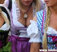 three blonde Oktoberfest angles in traditional skirts